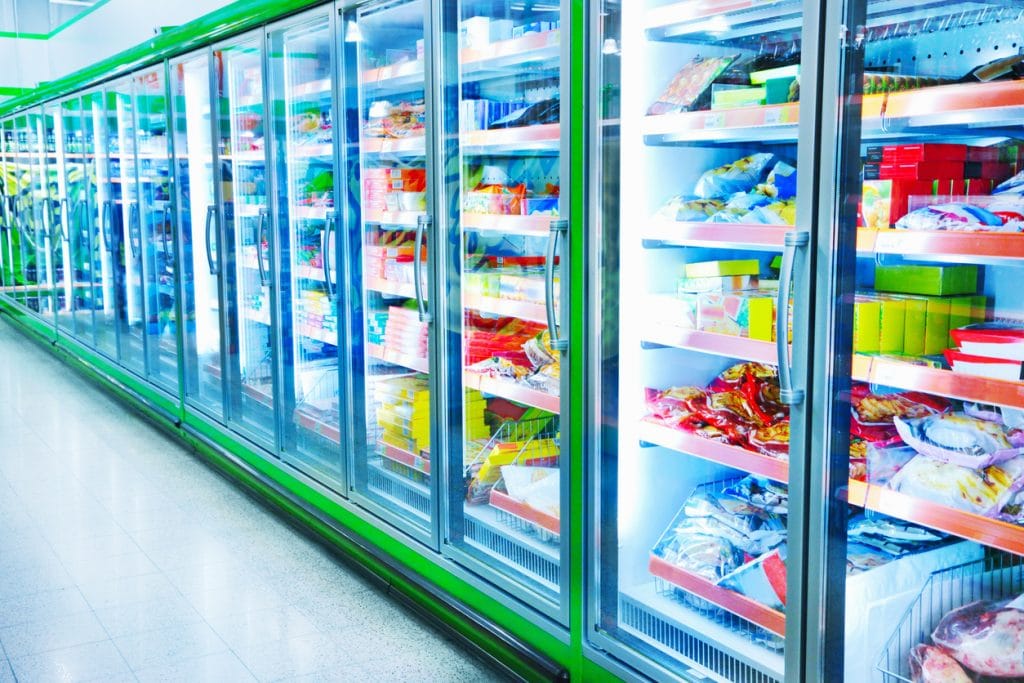 Refrigerators with products in supermarket