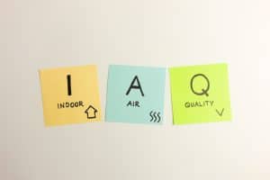 IAQ indoor air quality acronym handwritten on sticky notes